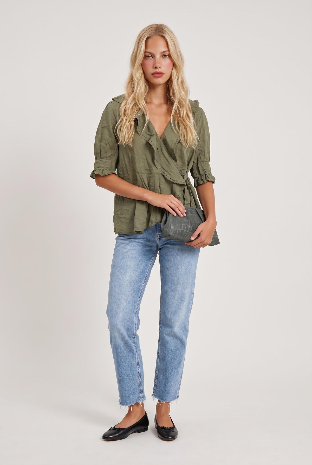 
model wearing Sage Ruffled Lace Trim Top posing Front View