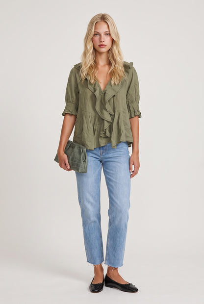 
model wearing Sage Ruffled Lace Trim Top posing Front View