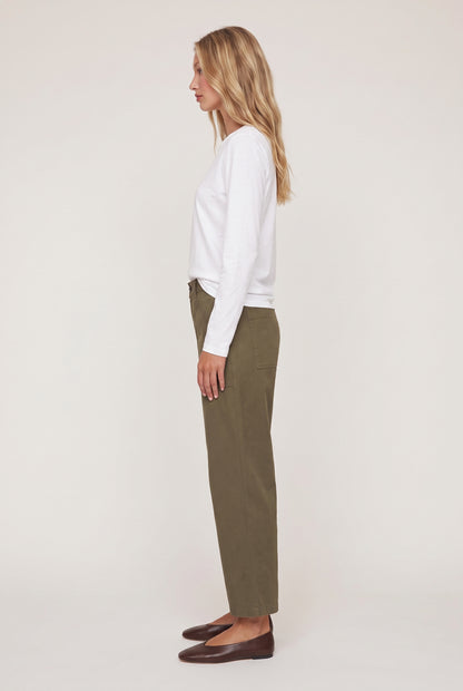 
model wearing Colman Bowed Utility Pant posing Side View