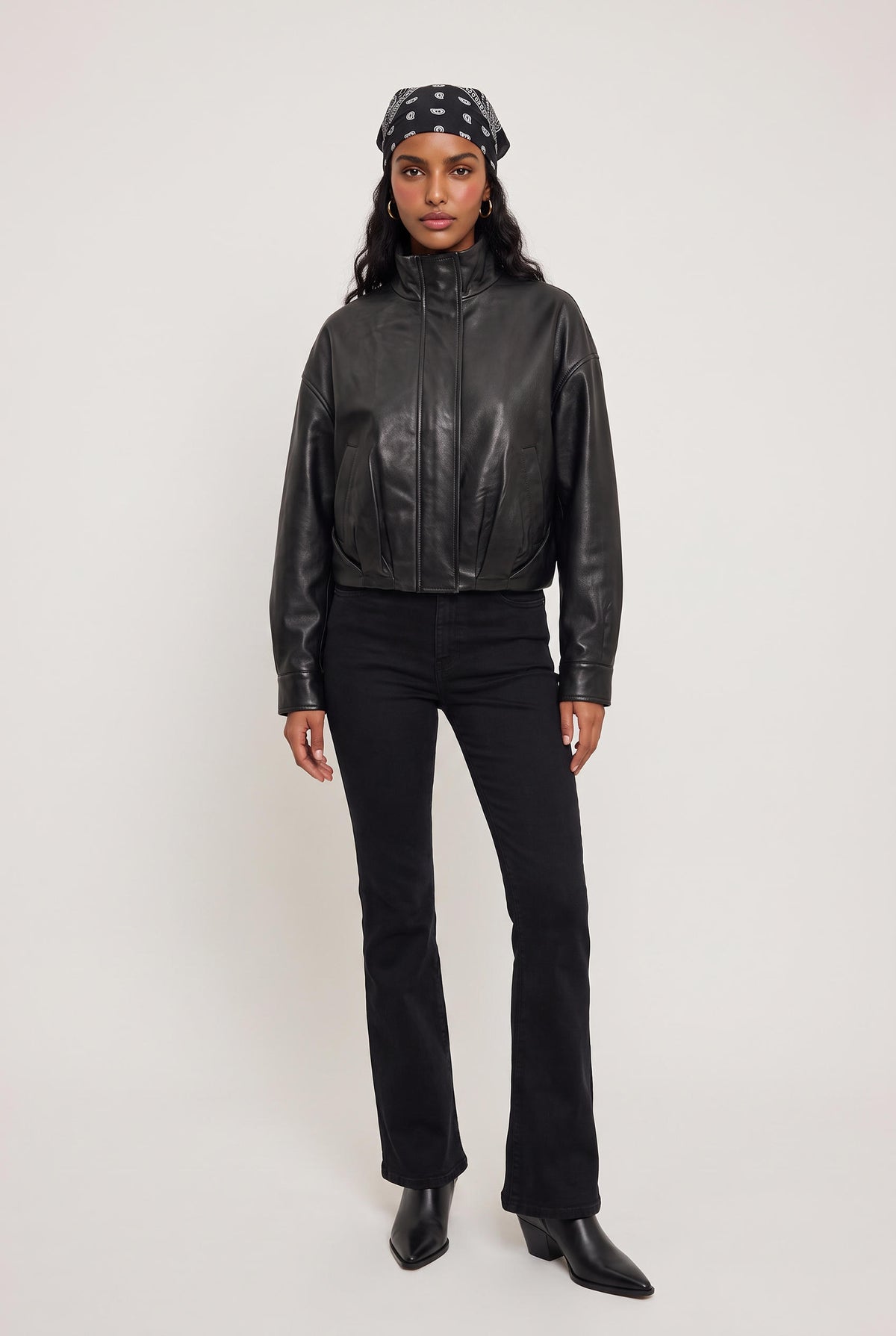 [BLACK] model wearing Corin Bubble Hem Jacket posing Front View