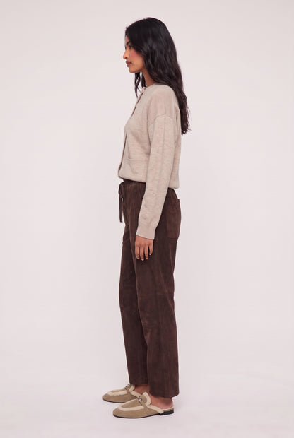 
model wearing Drift Suede Pant posing Side View