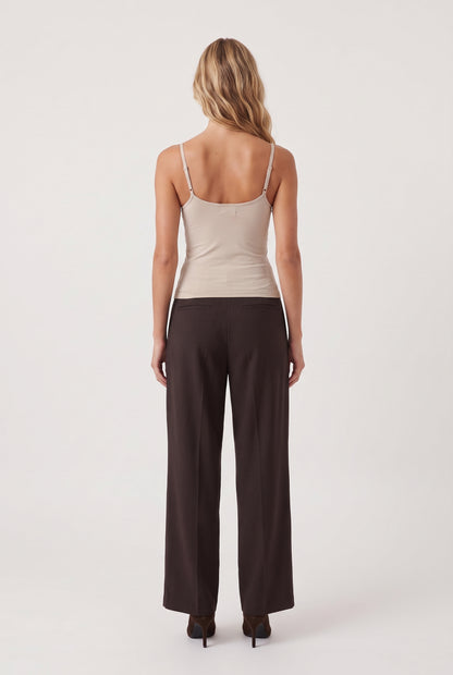 
model wearing Luxe Smooth Essential Tank posing Back View