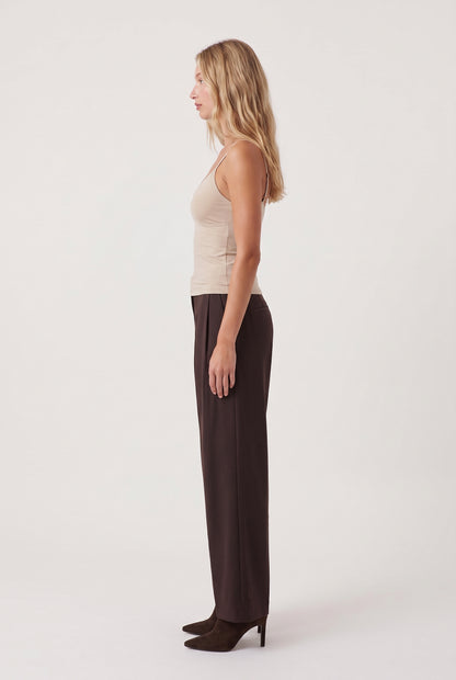 
model wearing Luxe Smooth Essential Tank posing Side View