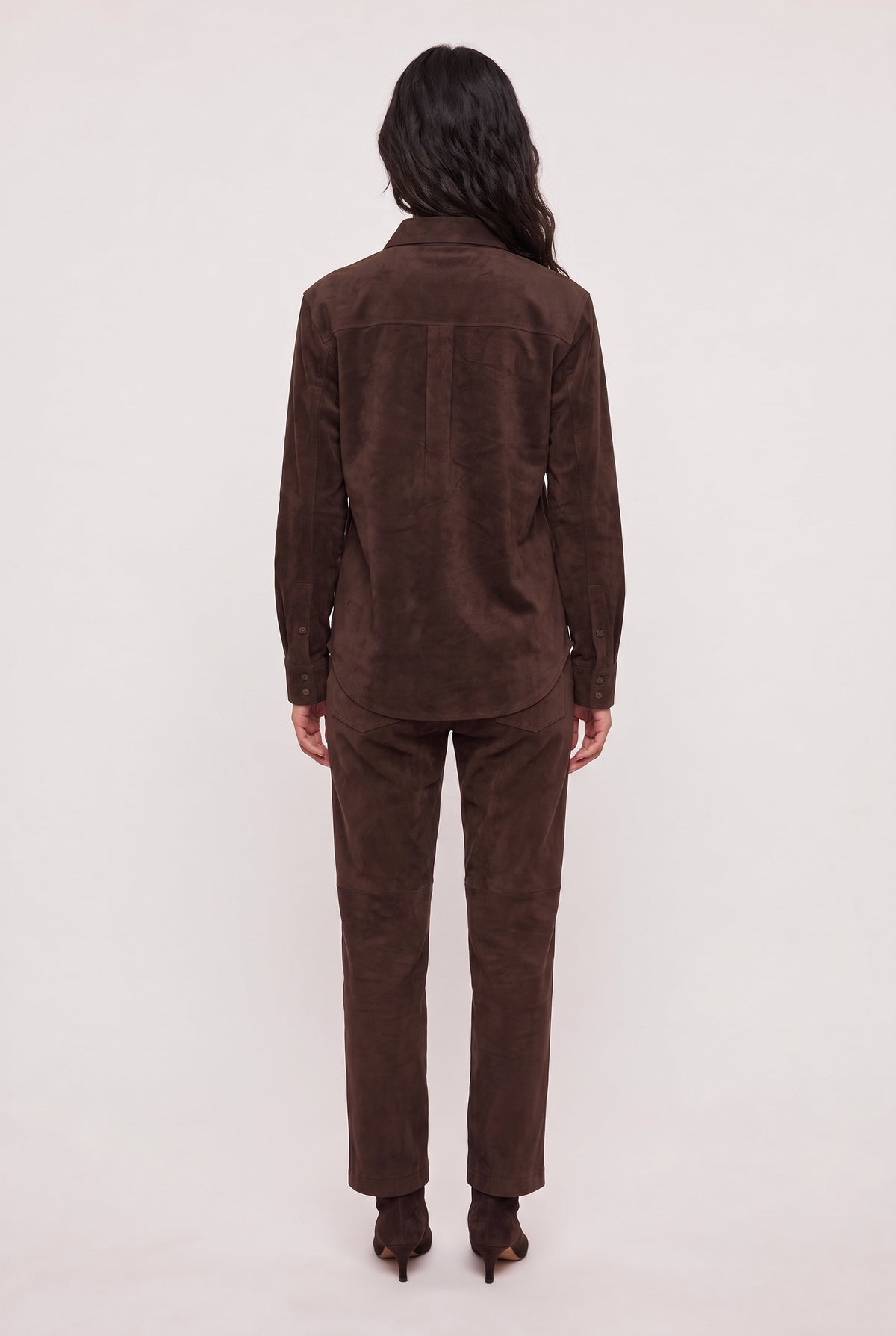 
model wearing Maren Suede Shirt posing Back View