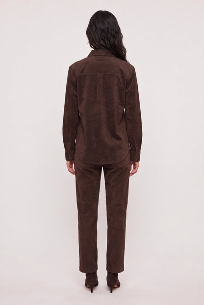 
model wearing Maren Suede Shirt posing Back View