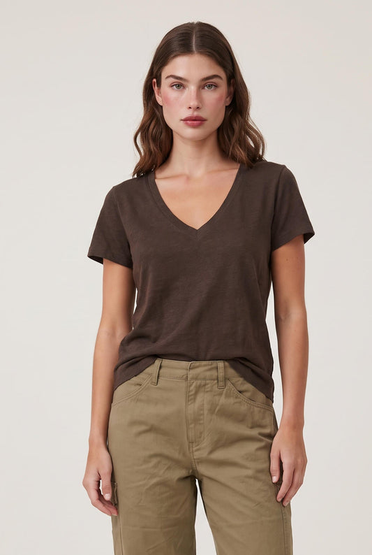 
model wearing Nomad V-neck Tee posing Front View