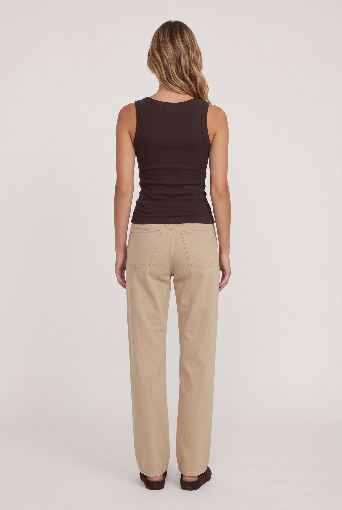 
model wearing Rowe Scoop Tank posing Back View
