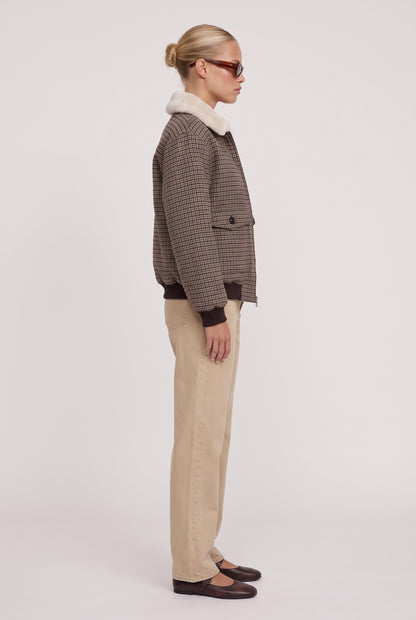 
model wearing Tavi Plaid Bomber Jacket posing Side View