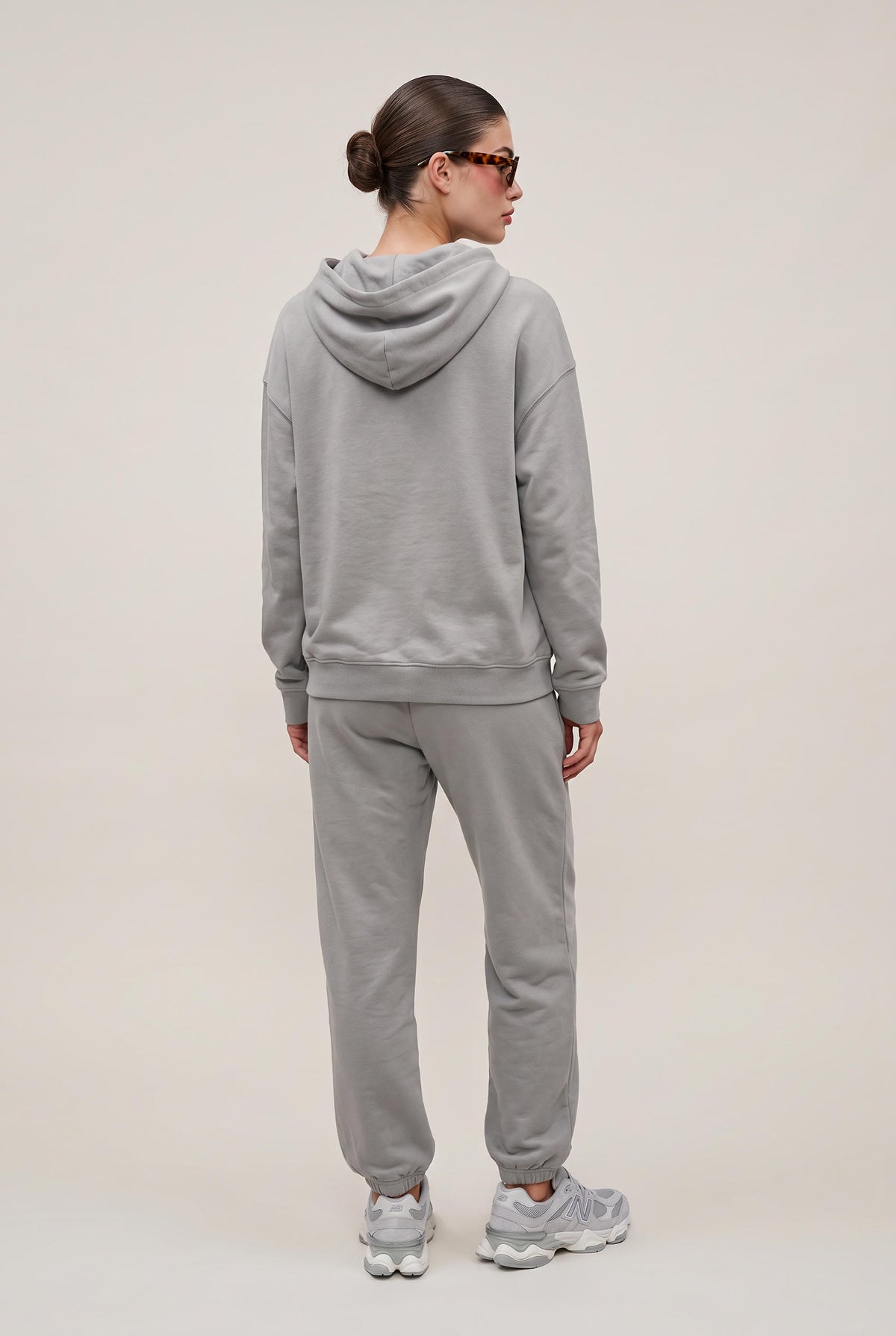 [SILVER] model wearing Uptown Jogger posing Front View