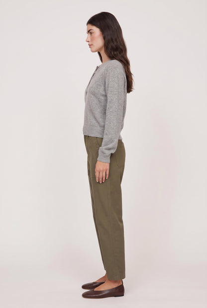 
model wearing Westmont Henley Sweater posing Side View