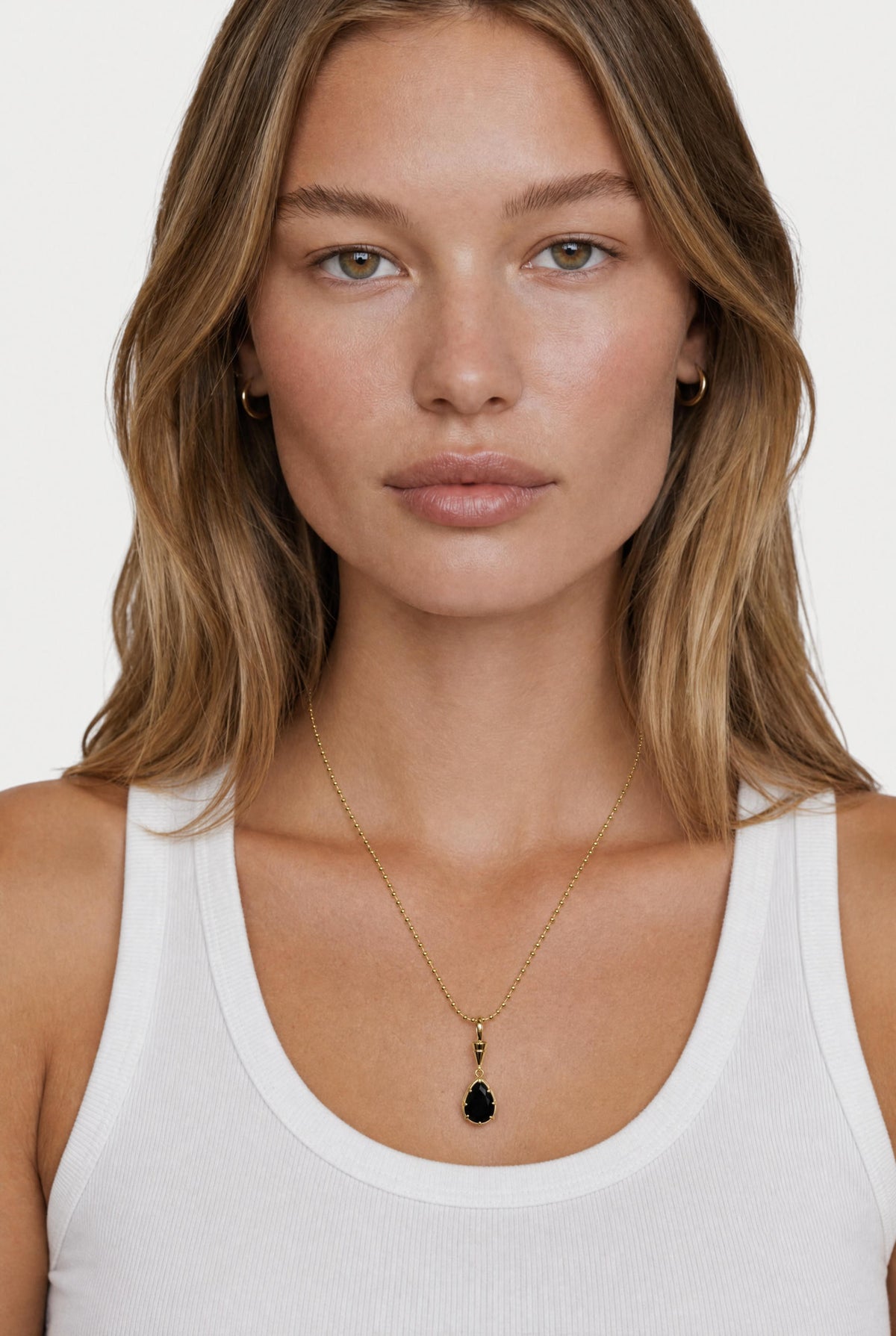 [Black] model wearing Issa Bezel Charm On Ball Chain posing Front View