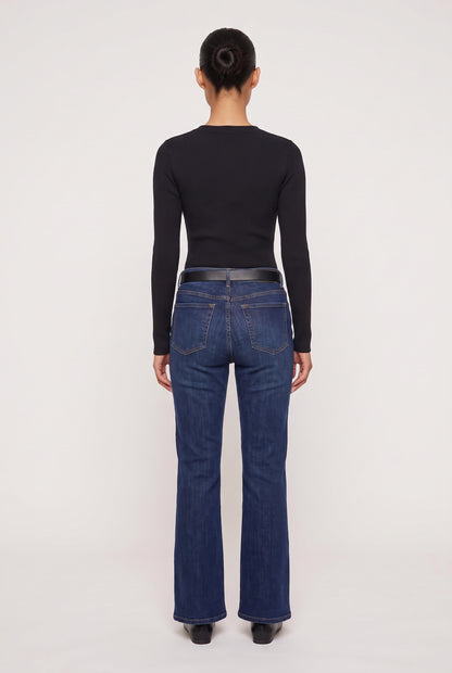 
model wearing Rowan Ribbed L/s Henley posing Back View