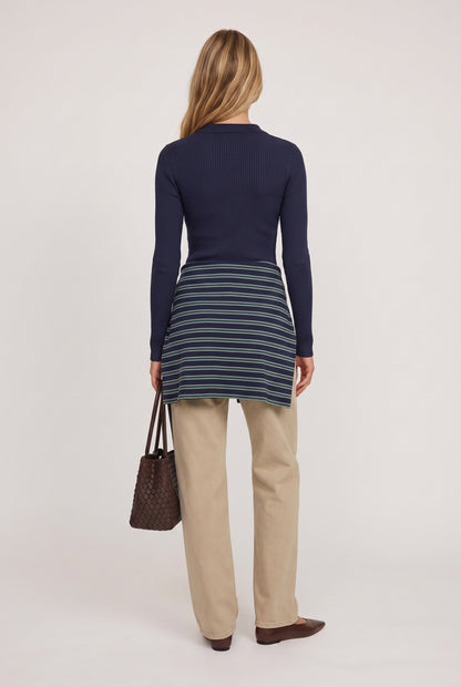 
model wearing Rowan Ribbed L/s Henley posing Back View