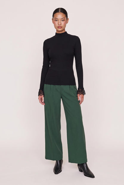 
model wearing Cordelia L/s Turtleneck posing Front View